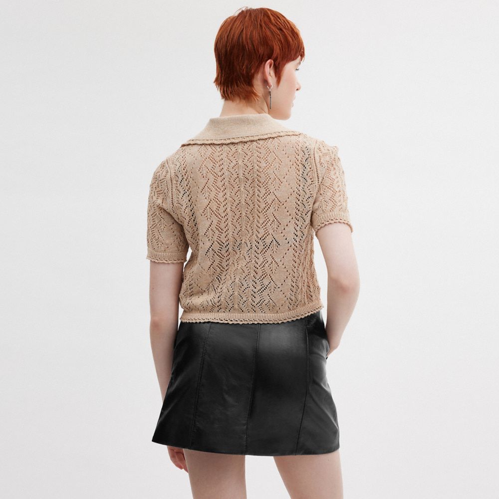 漆皮皮革迷你裙