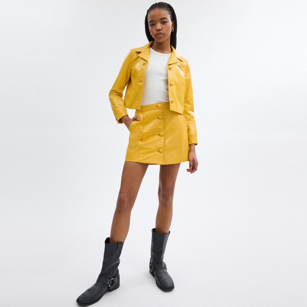 漆皮皮革迷你裙