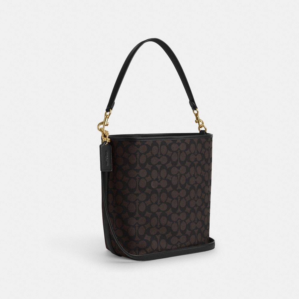 CITY LARGE BUCKET BAG IN SIGNATURE CANVAS