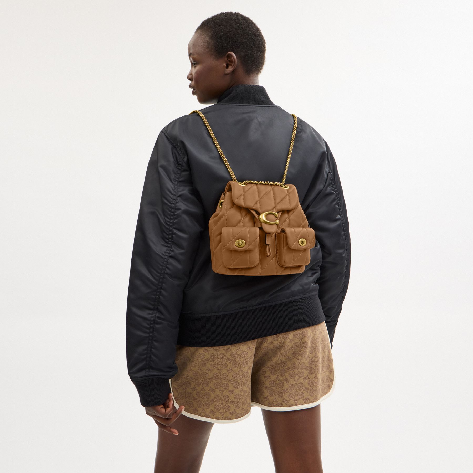 TABBY 絎縫後背包| COACH 官方網站Official page