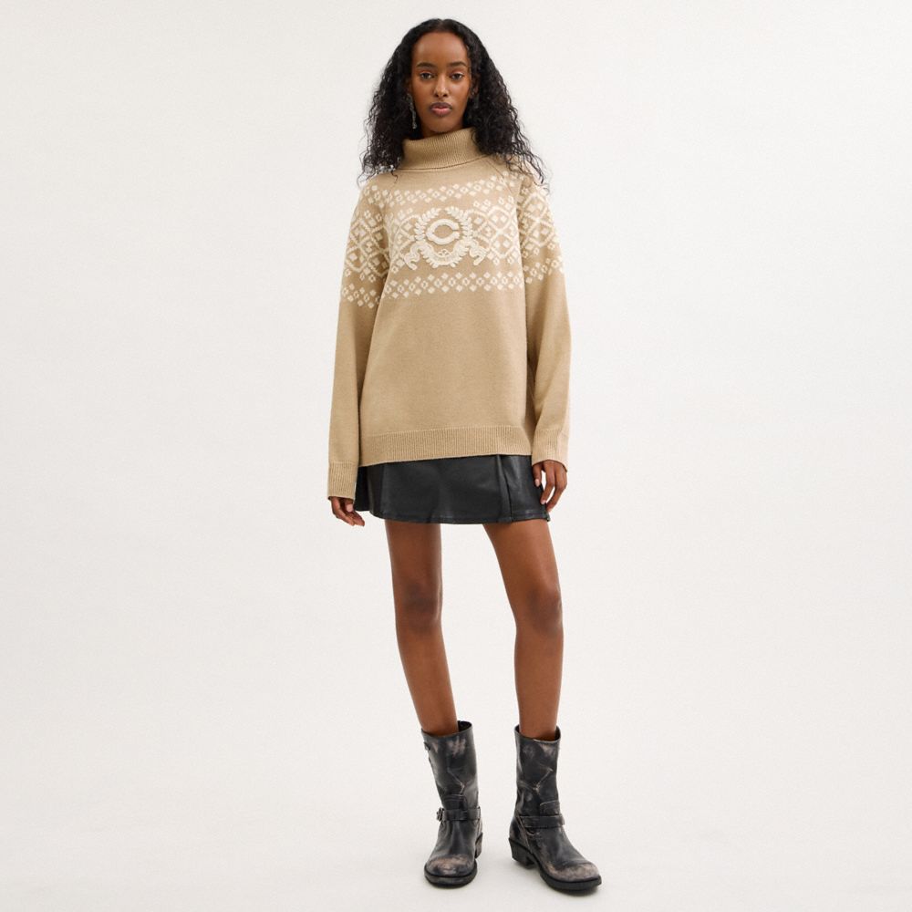 SIGNATURE CREST TURTLENECK