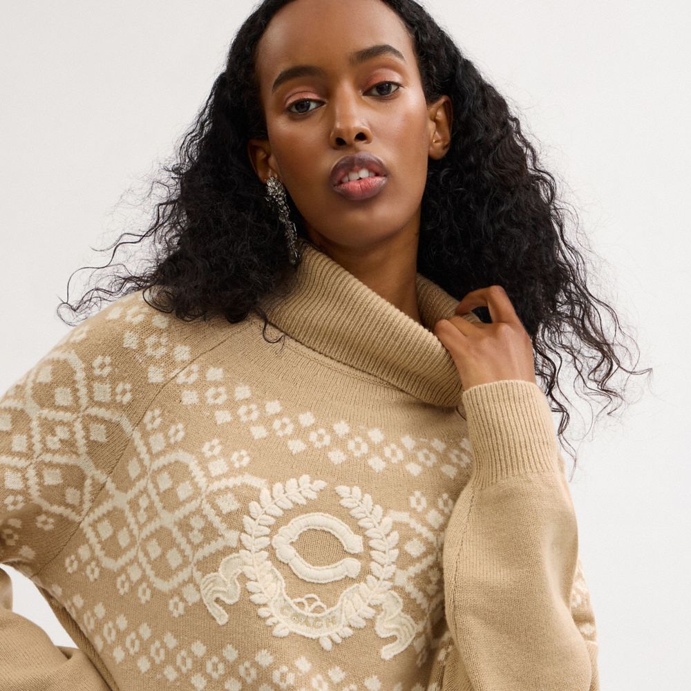 SIGNATURE CREST TURTLENECK
