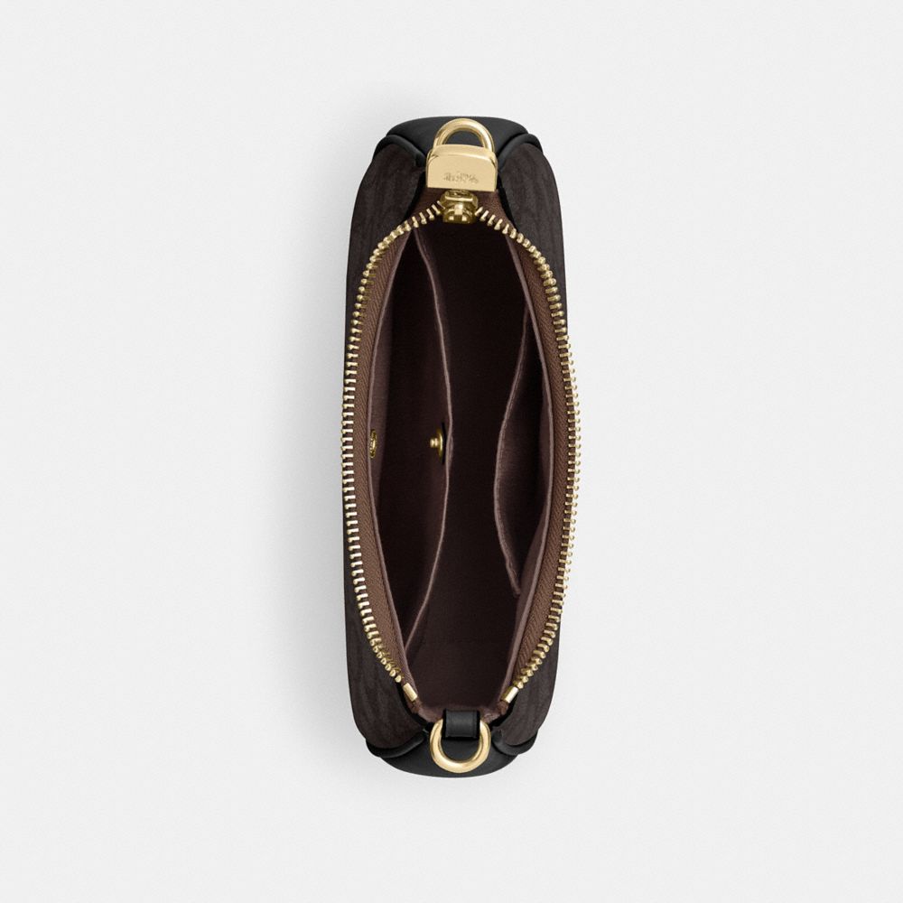 TERI MINI CROSSBODY BAG IN SIGNATURE CANVAS