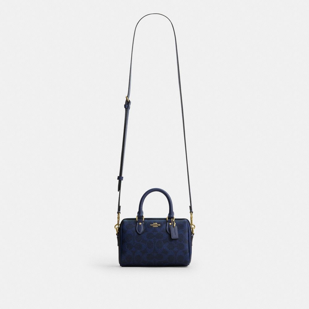 MINI ROWAN CROSSBODY BAG IN SIGNATURE CANVAS