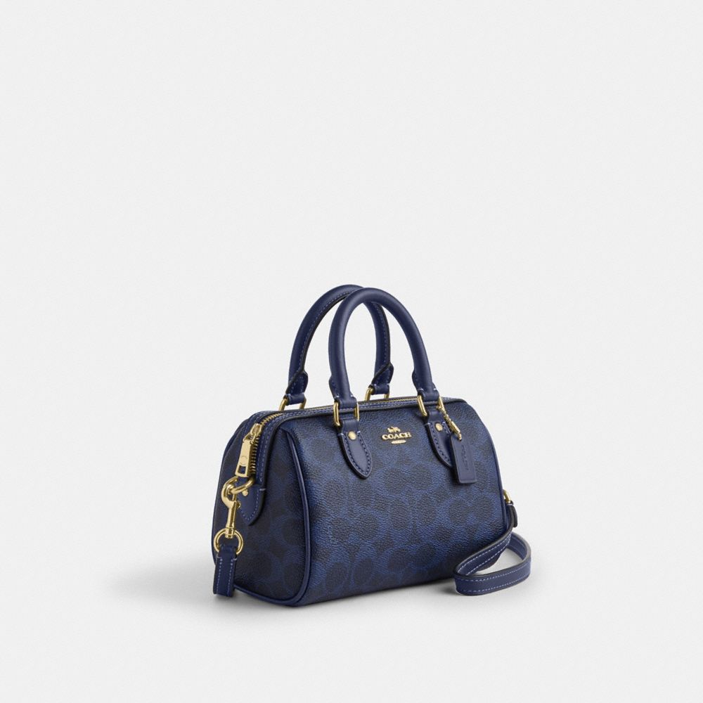 MINI ROWAN CROSSBODY BAG IN SIGNATURE CANVAS