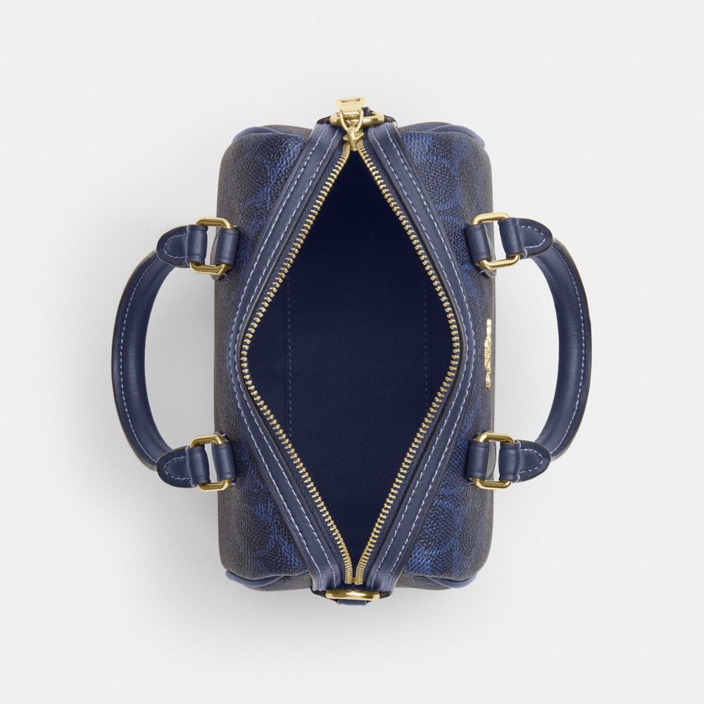 MINI ROWAN CROSSBODY BAG IN SIGNATURE CANVAS