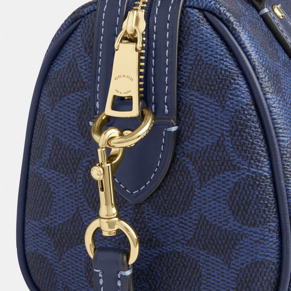 MINI ROWAN CROSSBODY BAG IN SIGNATURE CANVAS
