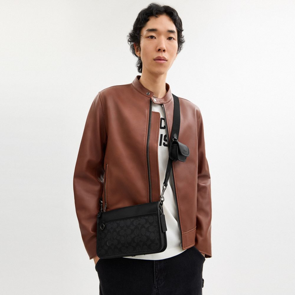 HERITAGE CONVERTIBLE CROSSBODY IN SIGNATURE CANVAS