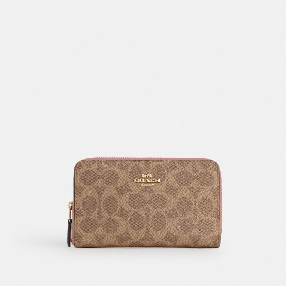 COACH CW781 Medium Id Zip Wallet In Signature Canvas GOLD/TAN/PINK PETAL