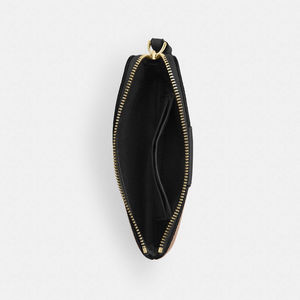CORNER ZIP WRISTLET IN SIGNATURE CANVAS WITH STRIPE
