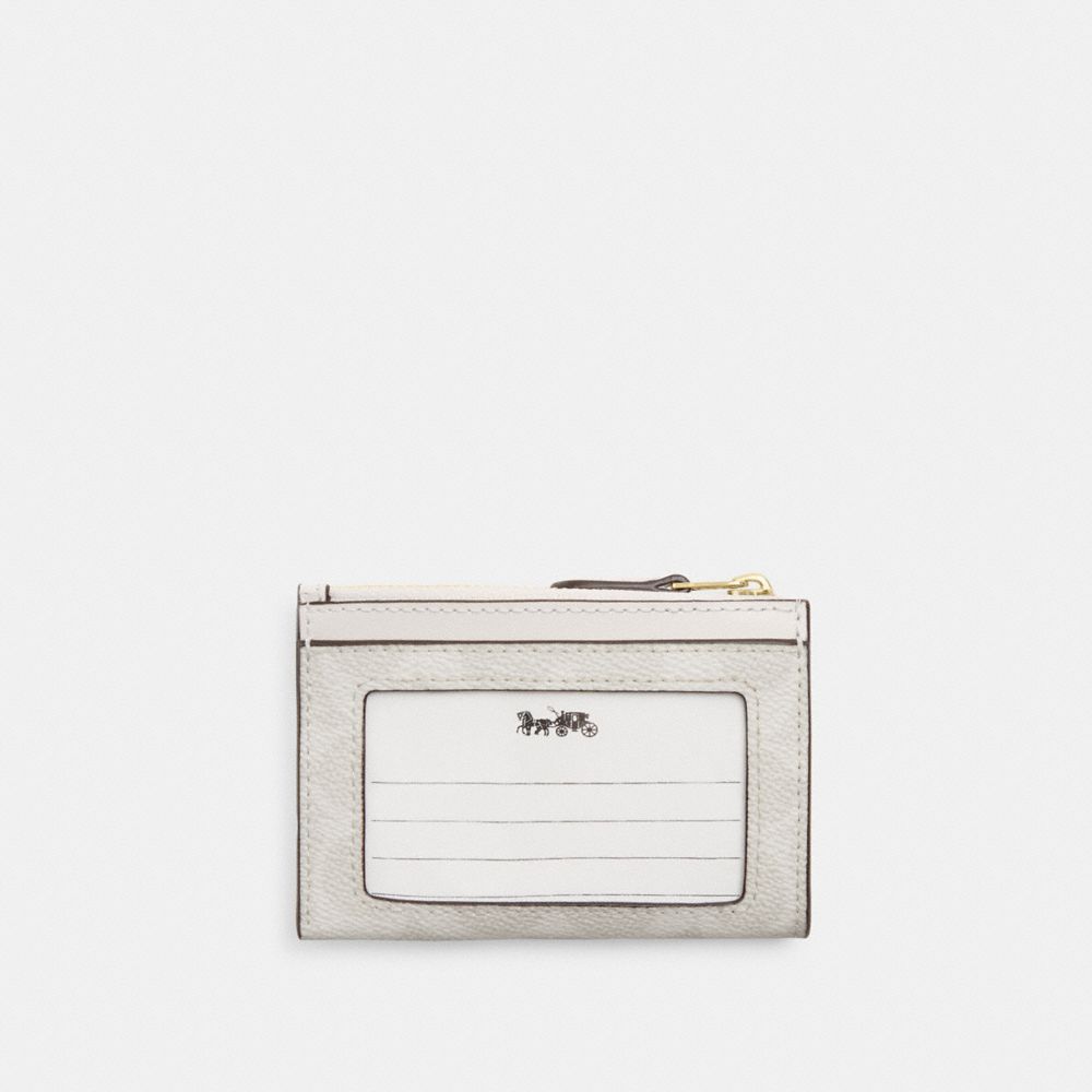 MINI SKINNY ID CASE IN SIGNATURE CANVAS