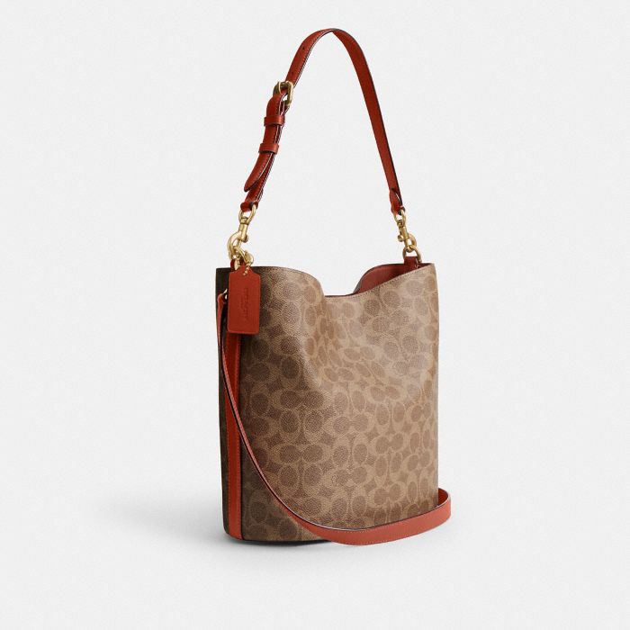 WILLOW SOFT BUCKET BAG IN SIGNATURE CANVAS