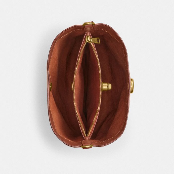 WILLOW SOFT BUCKET BAG IN SIGNATURE CANVAS