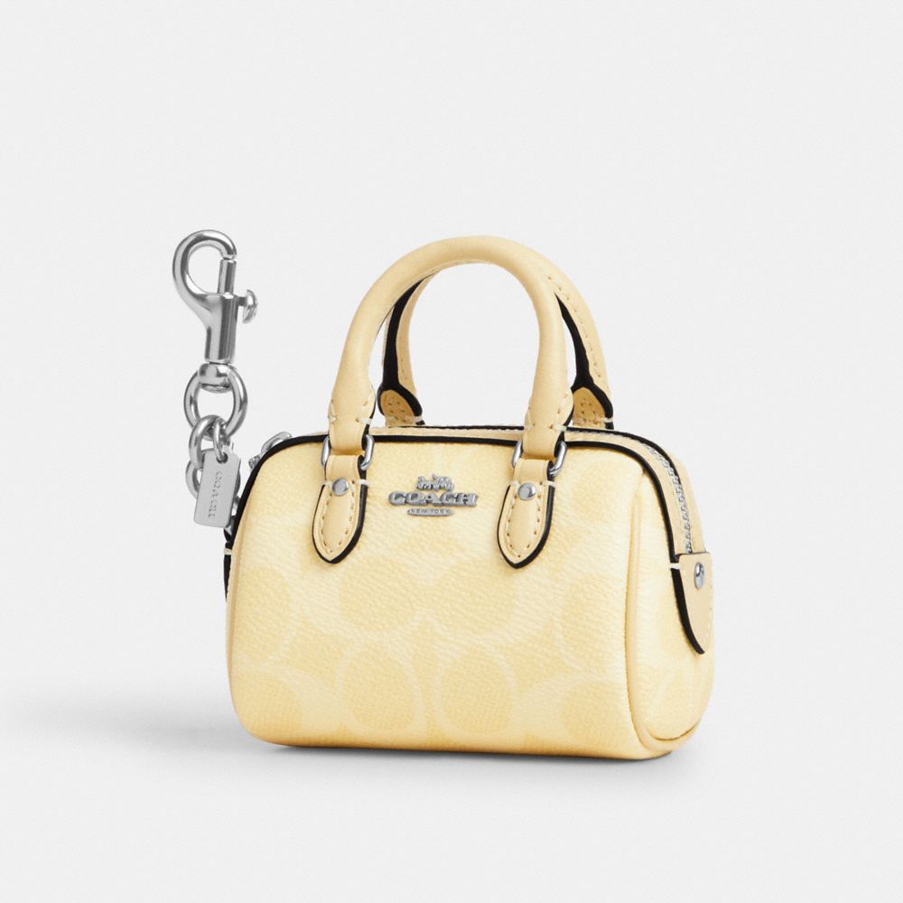 COACH CX068 Mini Rowan Bag Charm In Signature Canvas SILVER/HAY