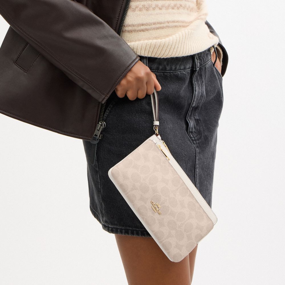 DOUBLE ZIP WALLET IN SIGNATURE CANVAS