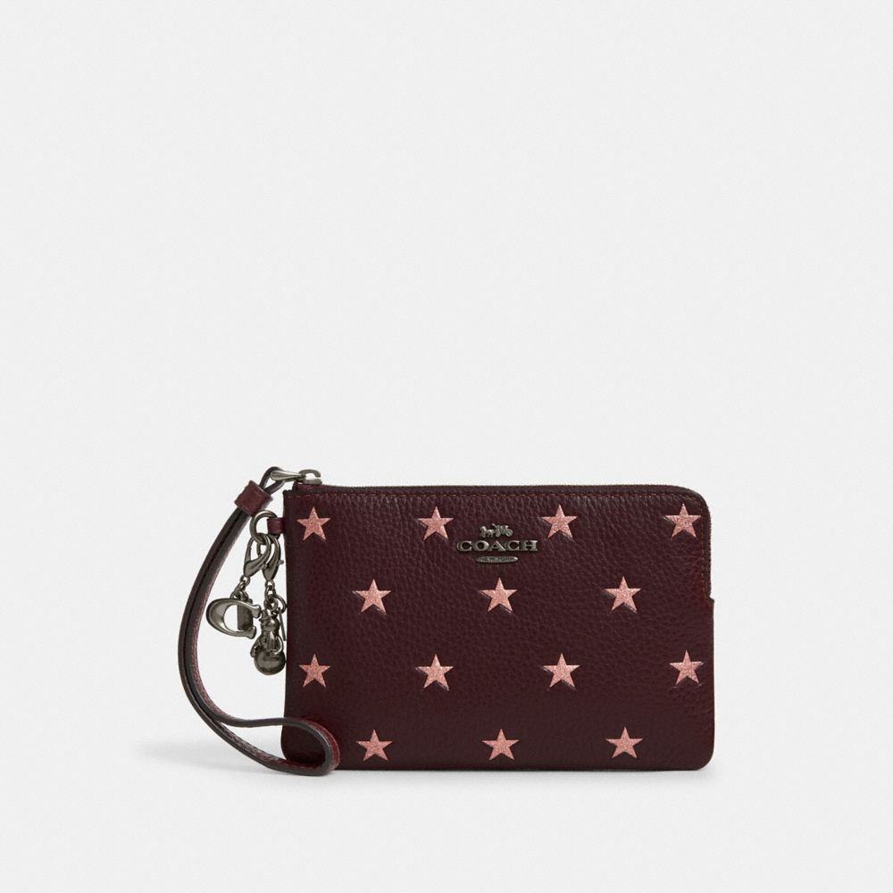 COACH CX174 Boxed Corner Zip Wristlet With Star Print And Charms QB/MERLOT MULTI