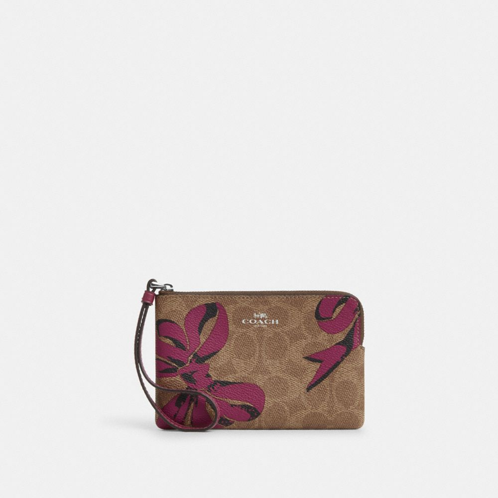 Corner Zip Wristlet In Signature Canvas With Bow Print - CZ440 - Silver/Tan/Pink Multi