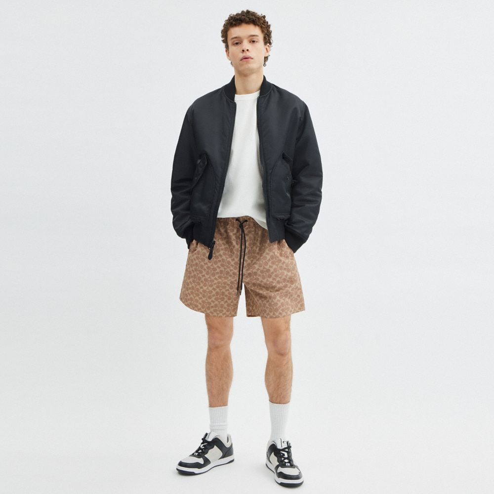 SIGNATURE SWIM TRUNKS IN RECYCLED POLYESTER