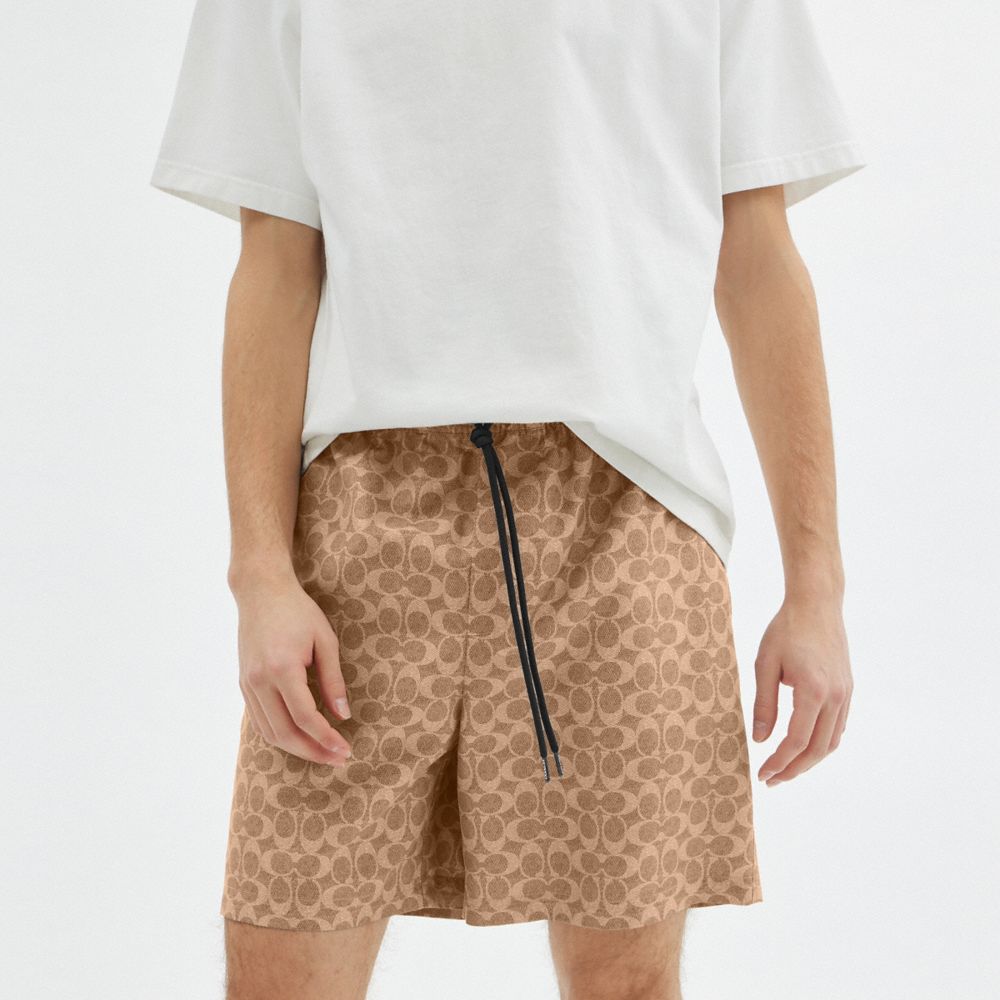 SIGNATURE SWIM TRUNKS IN RECYCLED POLYESTER