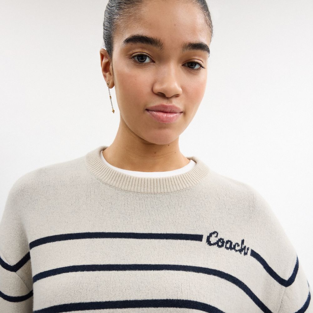 CURSIVE SIGNATURE STRIPED CROPPED SWEATER