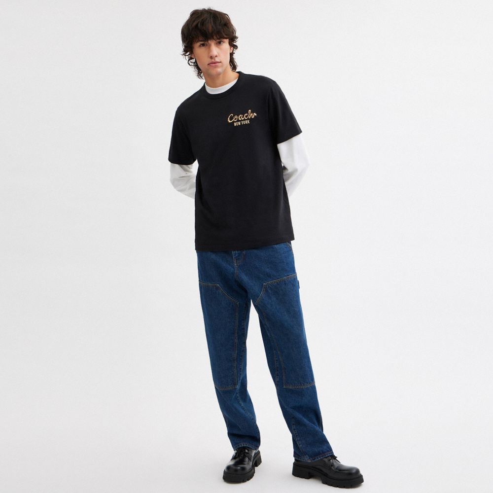 NEW YEAR COACH SNAKE SCRIPT T-SHIRT IN ORGANIC COTTON