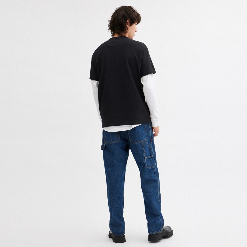 NEW YEAR COACH SNAKE SCRIPT T-SHIRT IN ORGANIC COTTON