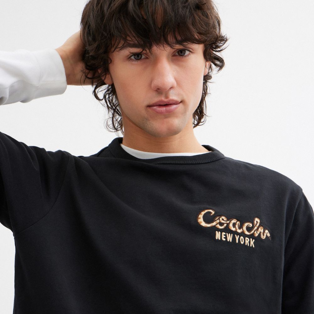 NEW YEAR COACH SNAKE SCRIPT T-SHIRT IN ORGANIC COTTON