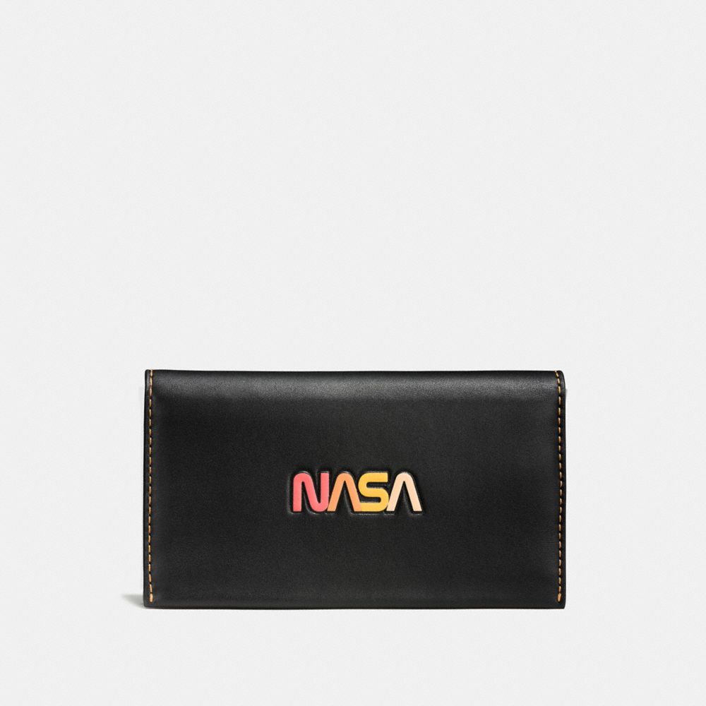 COACH F10467 - PHONE WALLET WITH EMBOSSED SPACE BLACK