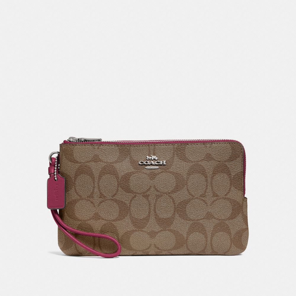 COACH DOUBLE ZIP WALLET IN SIGNATURE CANVAS - SV/KHAKI DARK FUCHSIA - F16109