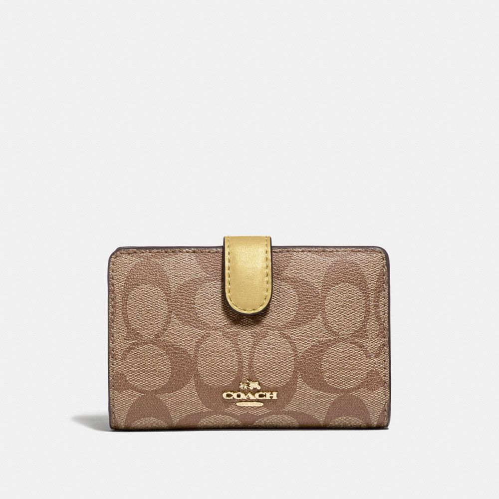 COACH MEDIUM CORNER ZIP WALLET IN SIGNATURE CANVAS - KHAKI/SUNFLOWER/GOLD - F23553