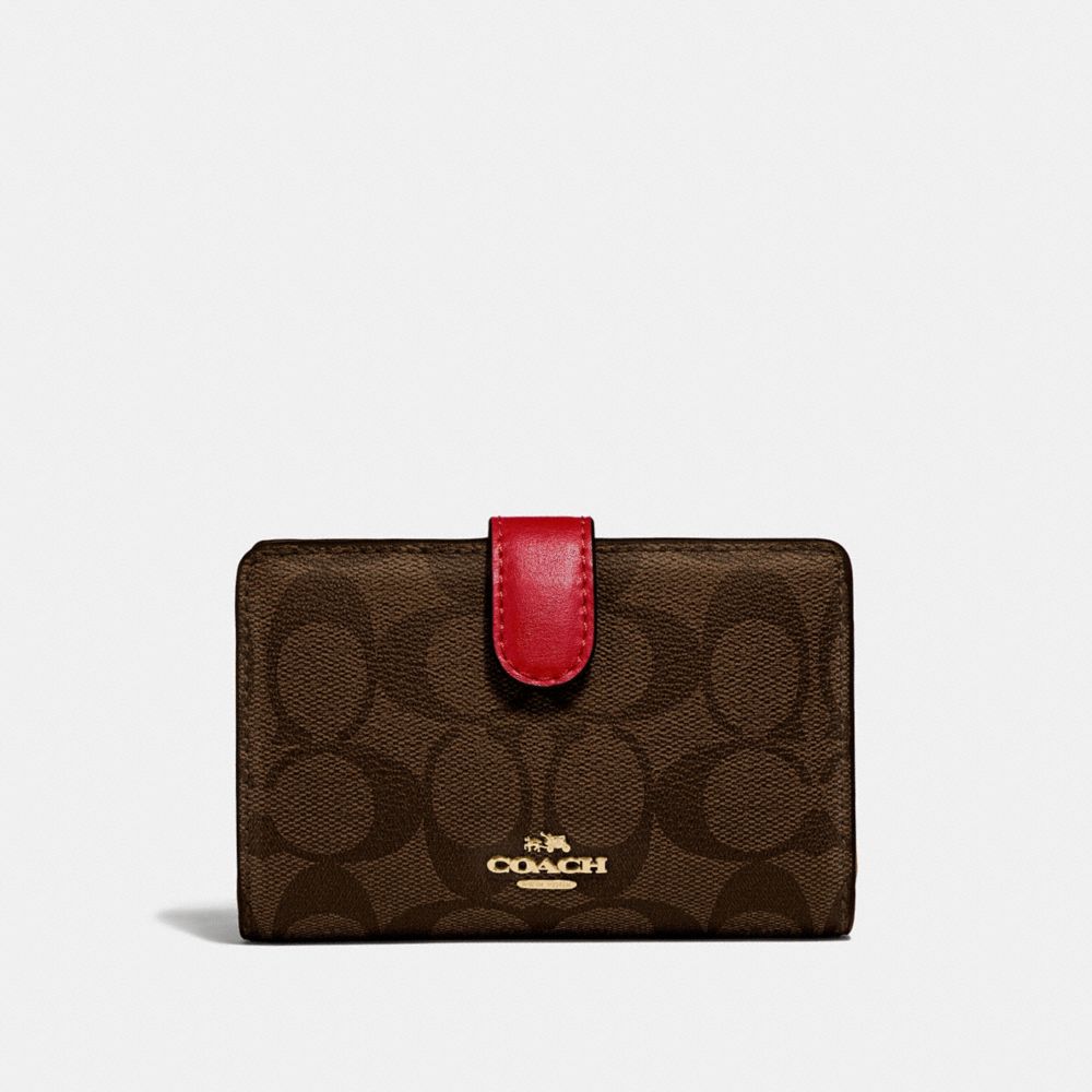 COACH MEDIUM CORNER ZIP WALLET IN SIGNATURE CANVAS - BROWN/RUBY/IMITATION GOLD - F23553