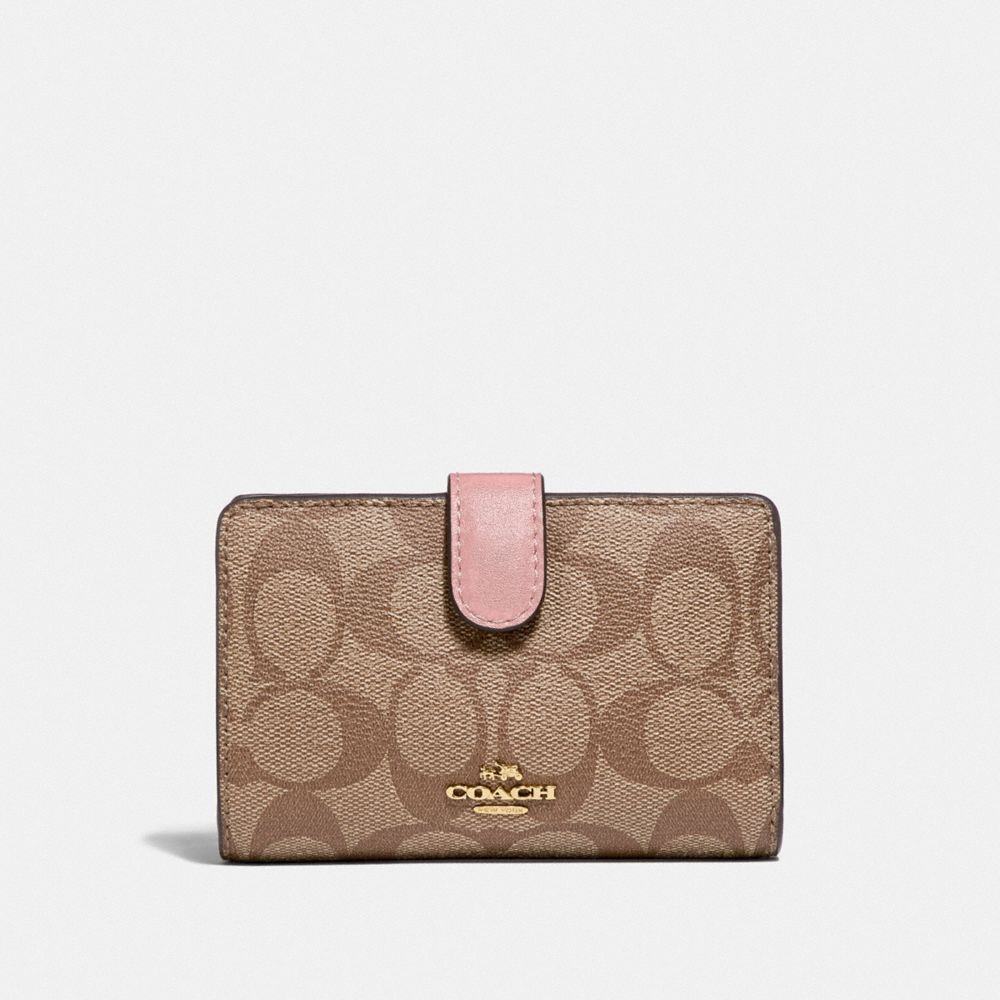 COACH MEDIUM CORNER ZIP WALLET IN SIGNATURE CANVAS - IM/KHAKI PINK PETAL - F23553