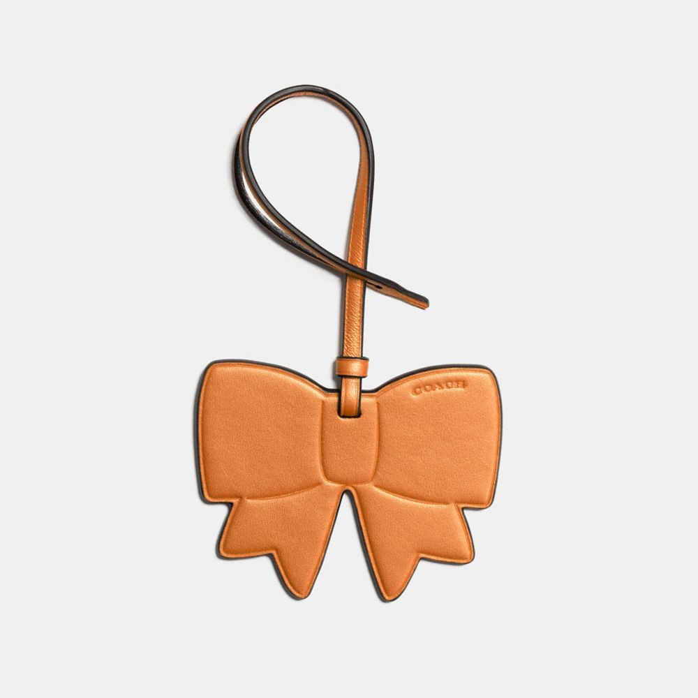 BOW ORNAMENT - METALLIC ORANGE - COACH F23558