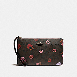 LARGE WRISTLET WITH PRIMROSE FLORAL SIGNATURE PRINT - COACH f24393 - IMBMC