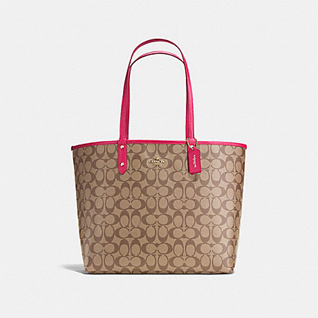 COACH REVERSIBLE CITY TOTE IN SIGNATURE CANVAS - Khaki/Bright Pink/Light Gold - f25033
