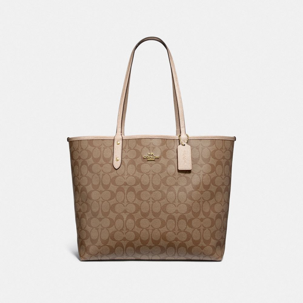 REVERSIBLE CITY TOTE IN SIGNATURE AND METALLIC CANVAS - f25849 - khaki/platinum/light gold