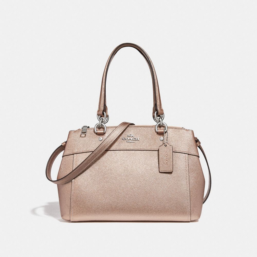 rose gold coach bag