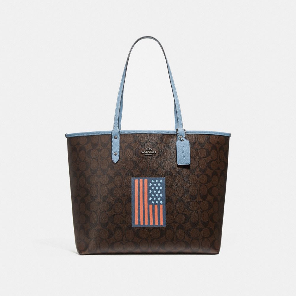 REVERSIBLE CITY TOTE IN SIGNATURE CANVAS WITH FLAG - BROWN BLACK/BLACK/BLACK ANTIQUE NICKEL - COACH F25949