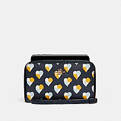 PHONE WALLET WITH CHECKER HEART PRINT - COACH f25963 - MIDNIGHT MULTI/LIGHT GOLD