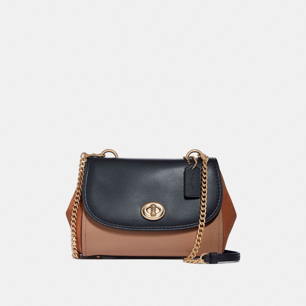 Coach mixed store material faye crossbody