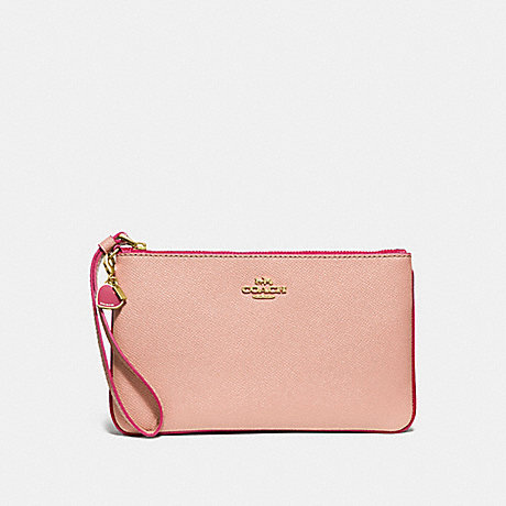 COACH LARGE WRISTLET WITH CHARMS - nude pink/imitation gold - f29398