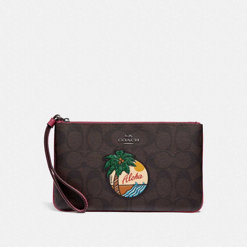 LARGE WRISTLET IN SIGNATURE CANVAS WITH ALOHA MOTIF - BROWN/BLACK/BLACK ANTIQUE NICKEL - COACH F29418