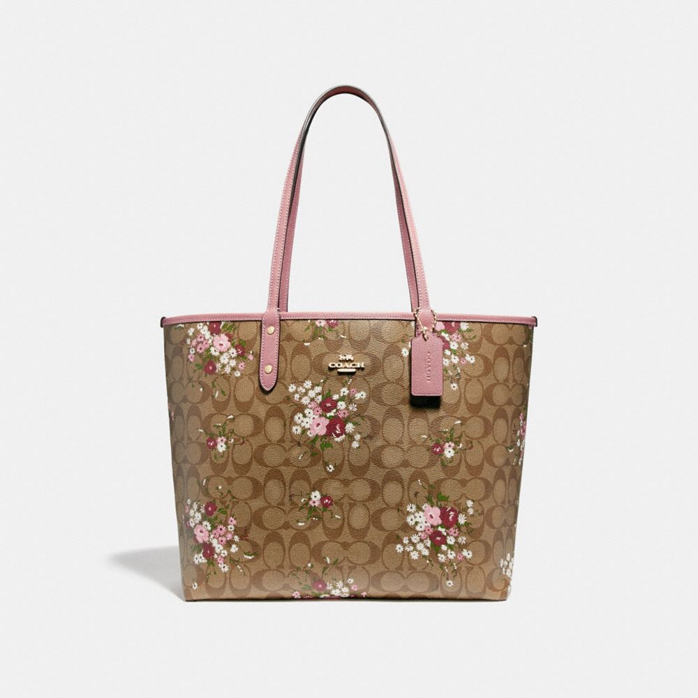 REVERSIBLE CITY ZIP TOTE IN SIGNATURE CANVAS WITH FLORAL BUNDLE PRINT - f29547 - khaki/multi/imitation gold