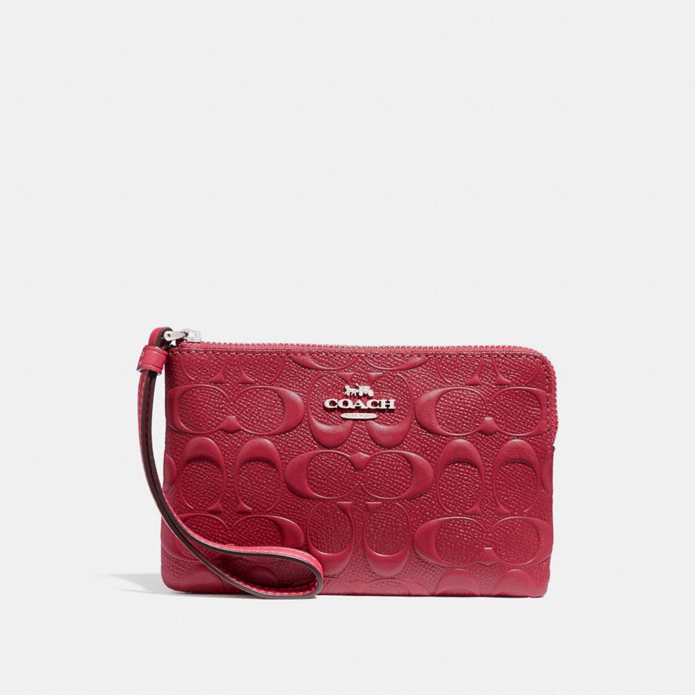 CORNER ZIP WRISTLET IN SIGNATURE LEATHER - SILVER/HOT PINK - COACH F30049