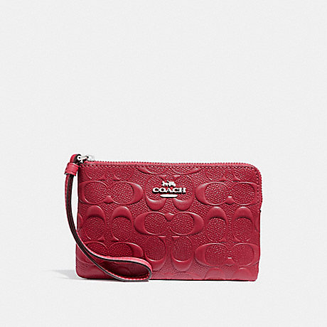 COACH CORNER ZIP WRISTLET IN SIGNATURE LEATHER - SILVER/HOT PINK - f30049