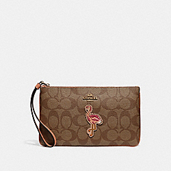 LARGE WRISTLET IN SIGNATURE CANVAS WITH FLAMINGO MOTIF - COACH f31124 - khaki/multi/imitation gold