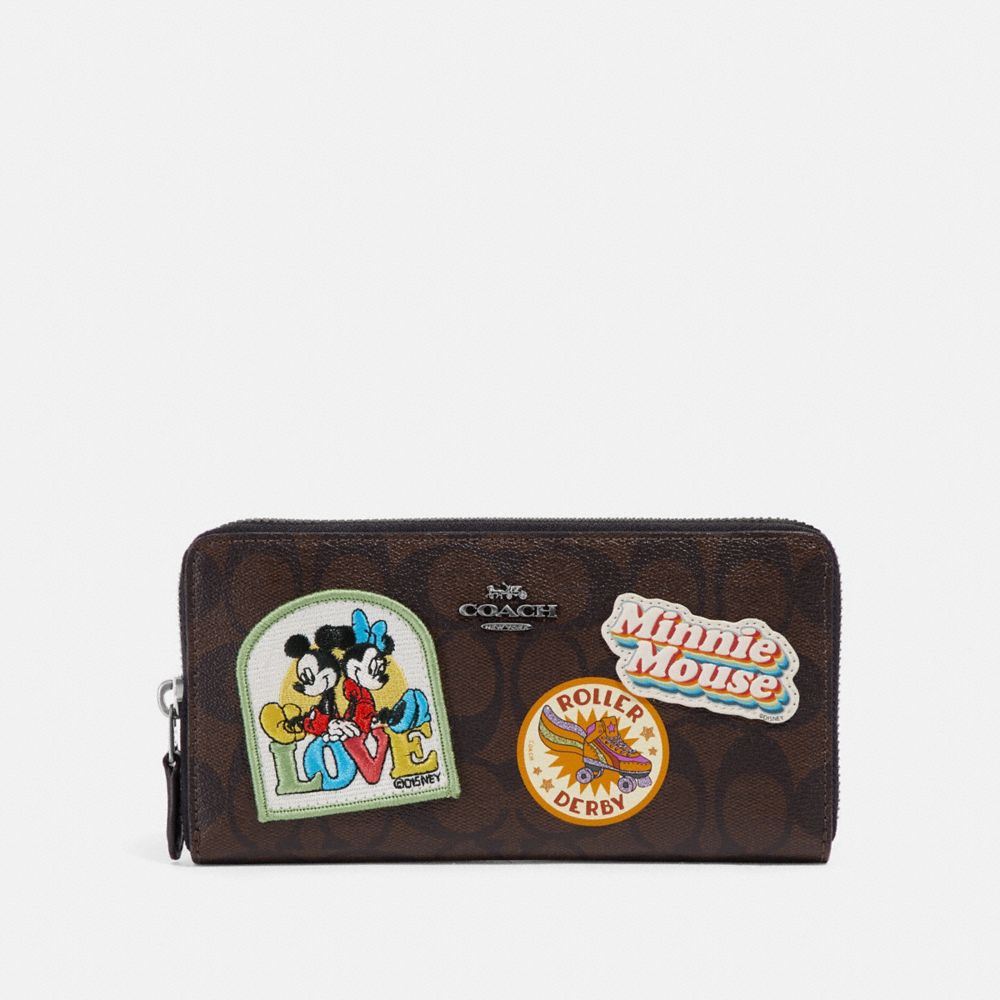 COACH ACCORDION ZIP WALLET IN SIGNATURE CANVAS WITH MINNIE MOUSE PATCHES - BROWN/BLACK/BLACK ANTIQUE NICKEL - f31350