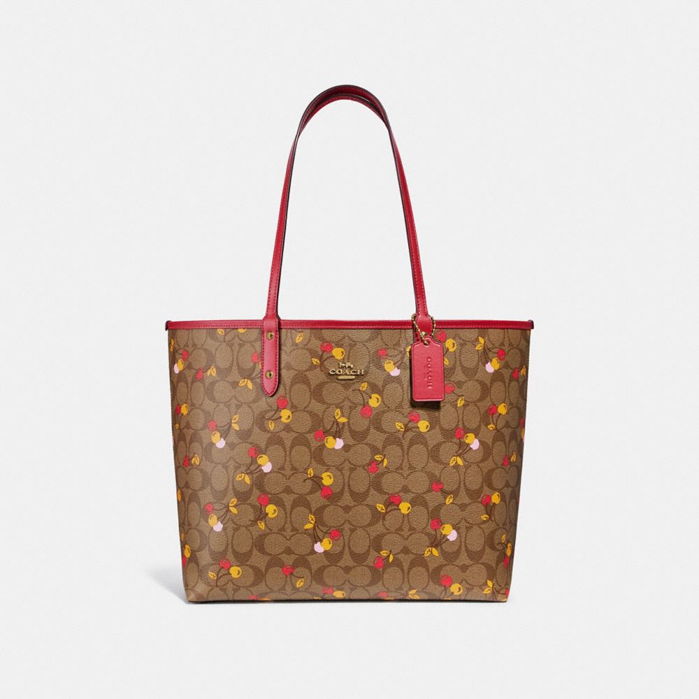 REVERSIBLE CITY TOTE IN SIGNATURE CANVAS WITH CHERRY PRINT - COACH f31389 - KHAKI MULTI /light gold