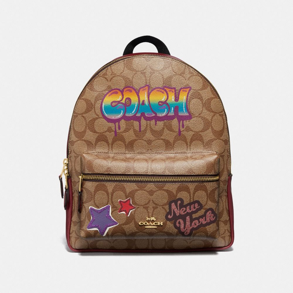 COACH MEDIUM CHARLIE BACKPACK IN SIGNATURE CANVAS WITH GRAFFITI - KHAKI MULTI /light gold - F31499