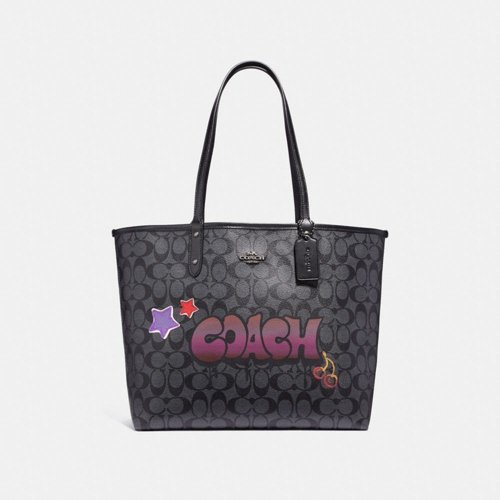 REVERSIBLE CITY TOTE IN SIGNATURE CANVAS WITH GRAFFITI - f31500 - black smoke multi/black antique nickel